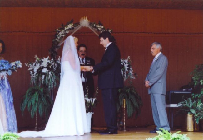 Wedding Ceremony - Placing of The Ring by The Bride