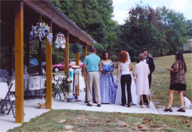 Wedding Guest Congratulating Bride & Groom