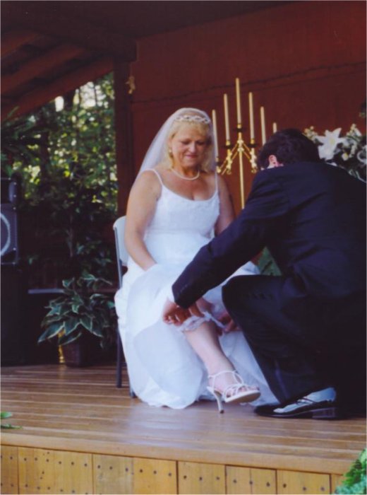 Groom Removing Bride's Garter